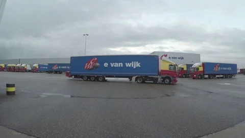 Dutch logistic company (E van Wijk) Trucks Stock Footage 83479074