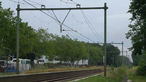 Dutch NS Sprinter train passing Stock Footage 112361456