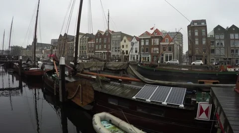 Dutch old houseboat floating house with renewable energie on roof 4k Stock Footage 59806303