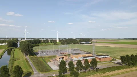 Dutch onshore windfarm and transformator substation Stock Footage 289959988