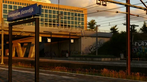 Dutch passenger train leaving Amsterdam Sloterdijk. Stock Footage 66932409