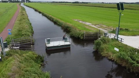 Dutch pont crossing the river Stock Footage 162076005