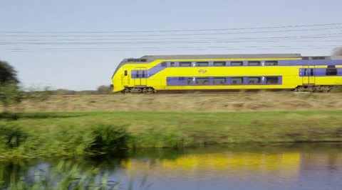 Dutch Railways Intercity train passing by Stock Footage 32281345