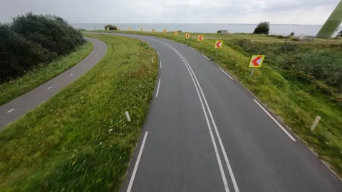 Dutch road infrastructure driving through a corner ultimate driving road in a Stock Footage 160313572