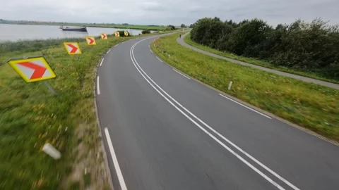 Dutch road infrastructure driving through a corner ultimate driving road in a Stock Footage 160388906