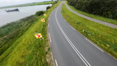Dutch road infrastructure driving through a corner ultimate driving road in a Stock Footage 160895864