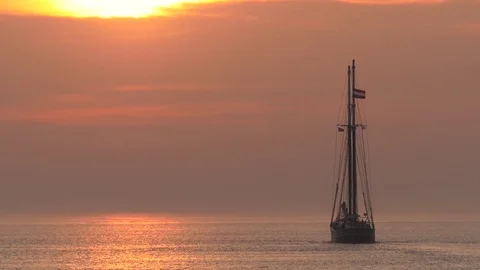 Dutch Sailing vessel at sunset. 4K Clip. Stock Footage 74356815