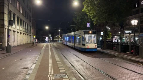 Dutch tram departing from a stop Stock Footage 318411319