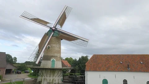 Dutch windmill drone shot going up Stock Footage 90081578