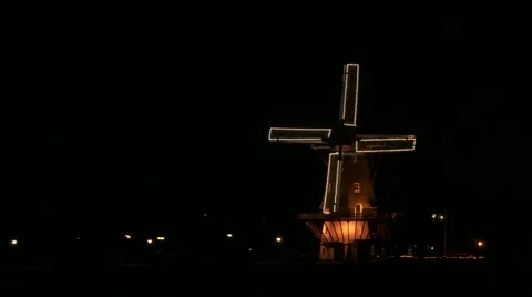 Dutch windmill with lights at night Stock Footage 13361032