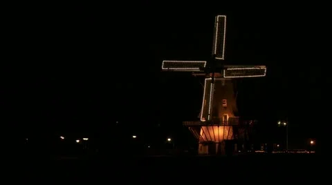 Dutch windmill with lights at night Stock Footage 13361604