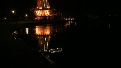 Dutch windmill with lights at night - tilt Stock Footage 13362779