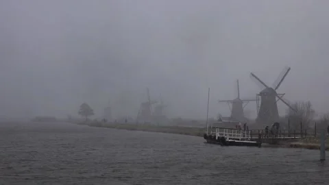 Dutch windmill snow scene Stock Footage 147922290