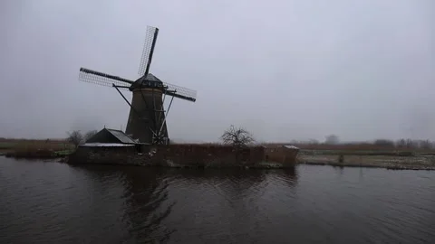 Dutch windmill snow scene Stock Footage 147922308