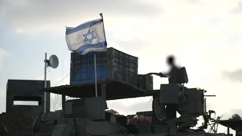 Duty soldier checking container equipment on Israeli military outpost station Stock Footage 310998212