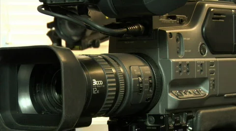 Dv-cam camcorder adjusting Stock Footage 361738