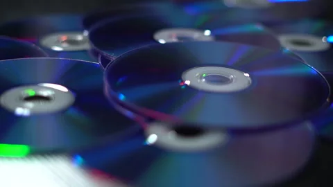 DVD-CDs. CDs of different colors Stock Footage 260647962