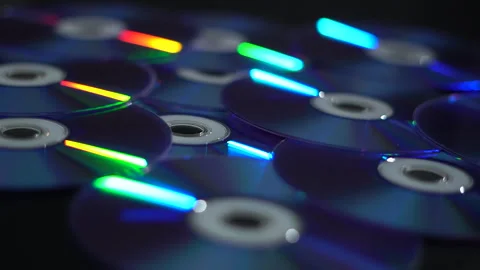 DVD-CDs. CDs of different colors Stock Footage 260647994