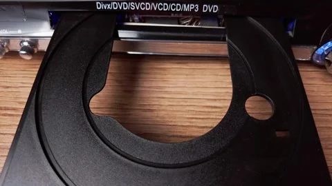 DVD Compact Disc is Ejected From the Player Video stock 260329008