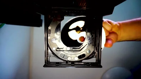 DVD Disc Inserted Into Drive, Camera Looking Up, Blue Lighting, HD Stock Footage 234478960