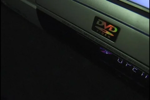 DVD Disc Inserting into Player Stock Footage 297448