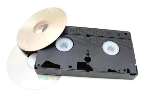 Dvd disks and vhs video the cartridge Stock Photos