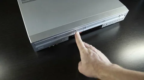 DVD Player-insert DVD top view wide MVI-4709 Stock Footage 1042525