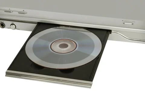 DVD player with inserted disc taken closeup on white. Stock Photos