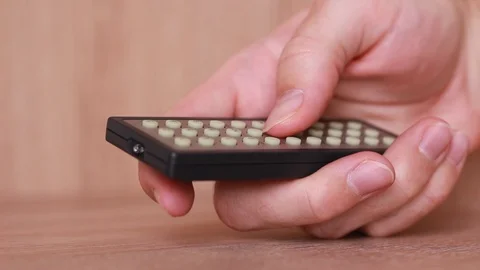 DVD remote control thumbing Stock Footage 87971609