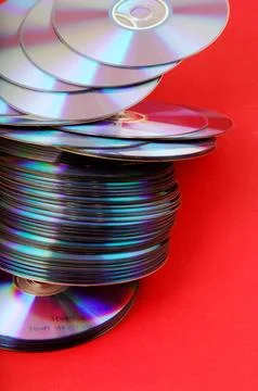 DVDs neatly arranged on a table Stock Photos