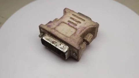 Dvi to vga converter computer rotates using display rotation, PC screen cable Stock Footage 255519385
