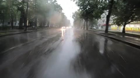 DVR view from car moving fast forward on the rainy road. Stock Footage 145489862