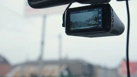 The DVR works in the car. Video recording of the traffic situation while driving Stock Footage 173360202