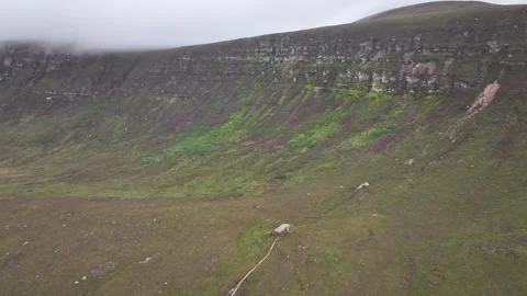 Dwarfie Stane, Orkney, Long Drone Clip, Megalithic Tomb, Valley, Hoy Island, 4K Video stock 258031263
