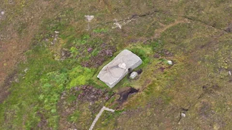 Dwarfie Stane, Orkney, Spiralling Drone Clip, Megalithic Tomb, Hoy Island, 4K Stock Footage 258126363