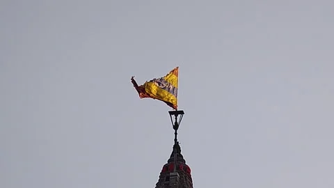 Dwarkadhish temple flag waving on shikhara in Dwarka Gujarat devotional footage Stock Footage 336415392