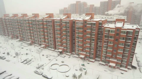 Dwelling buildings in snowing Stock Footage 32790784