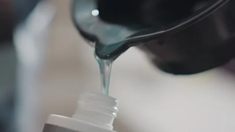 Dye transfer process, detailed scene of dye application preparation, focused Stock Footage 323116412
