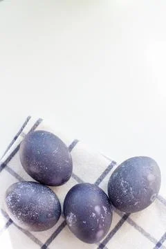 Dyed blue and marble easter eggs. Vertical Stock Photos