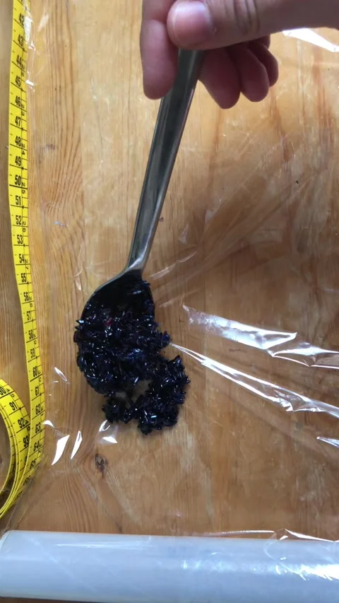 Dyed Dark Blue Rice Texture In Plastic Wrap CloseUp Stock Footage 333062623