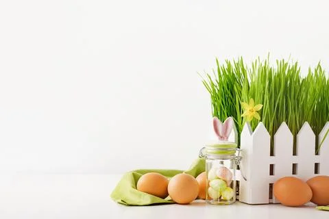 Dyed Easter eggs in the basket. Easter holiday concept. Stock Photos