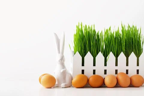 Dyed Easter eggs in the basket. Easter holiday concept. Stock Photos