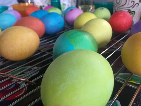 Dyed Easter Eggs Drying on a Cooling Rack Stock Photos