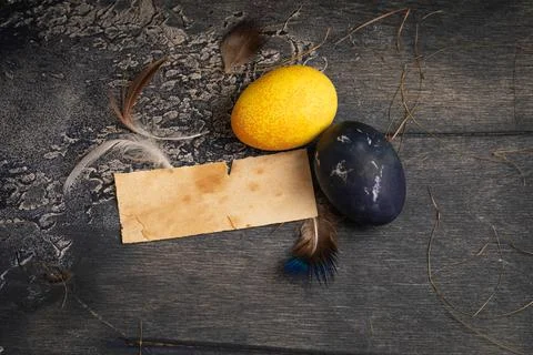 Dyed Easter eggs painted with natural dye on old background Stock Photos
