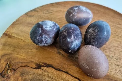 Dyed Easter eggs in red wine Stock Photos