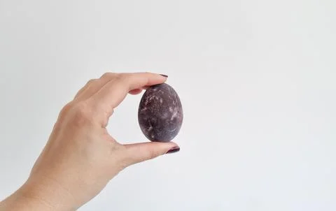 Dyed Easter eggs in red wine Stock Photos