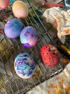 Dyed Easter Eggs Sitting on a Cooling Rack Drying Stock Photos