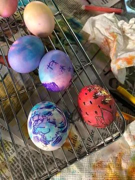 Dyed Easter Eggs Sitting on a Cooling Rack Drying Stock Photos