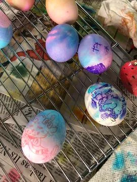 Dyed Easter Eggs Sitting on a Cooling Rack Drying Stock Photos