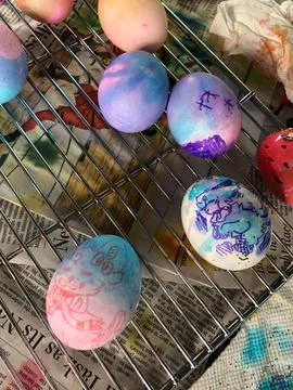 Dyed Easter Eggs Sitting on a Cooling Rack Drying Stock Photos